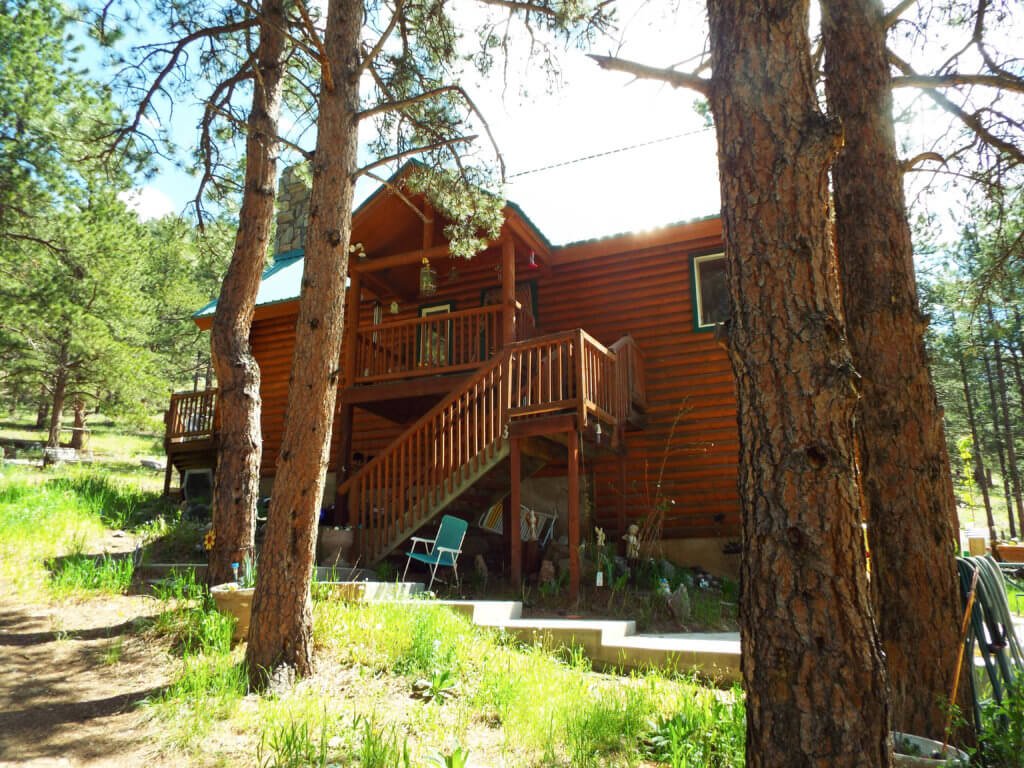 7/16 BEAUTIFUL LOG CABIN * 35 ACRES * LOVELAND COLORADO