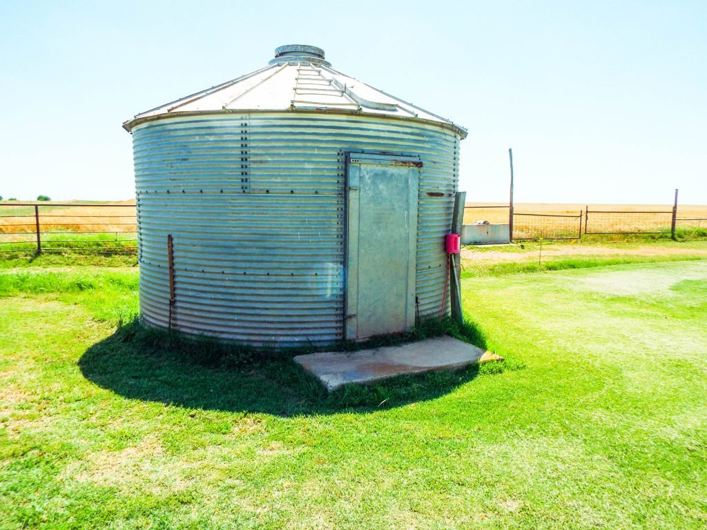 7/21 Douglas OK * 157± acres * Large pond * Metal Building * Highway frontage