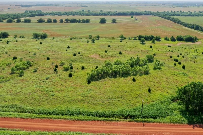 8/9 37.69± ACRES * LOGAN/KINGFISHER COUNTY LINE