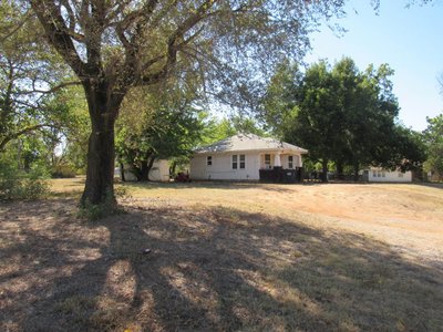 Tract 6: 639 E. Maple Enid, Oklahoma & Tract 8: 305 E. Indiana Enid, Oklahoma