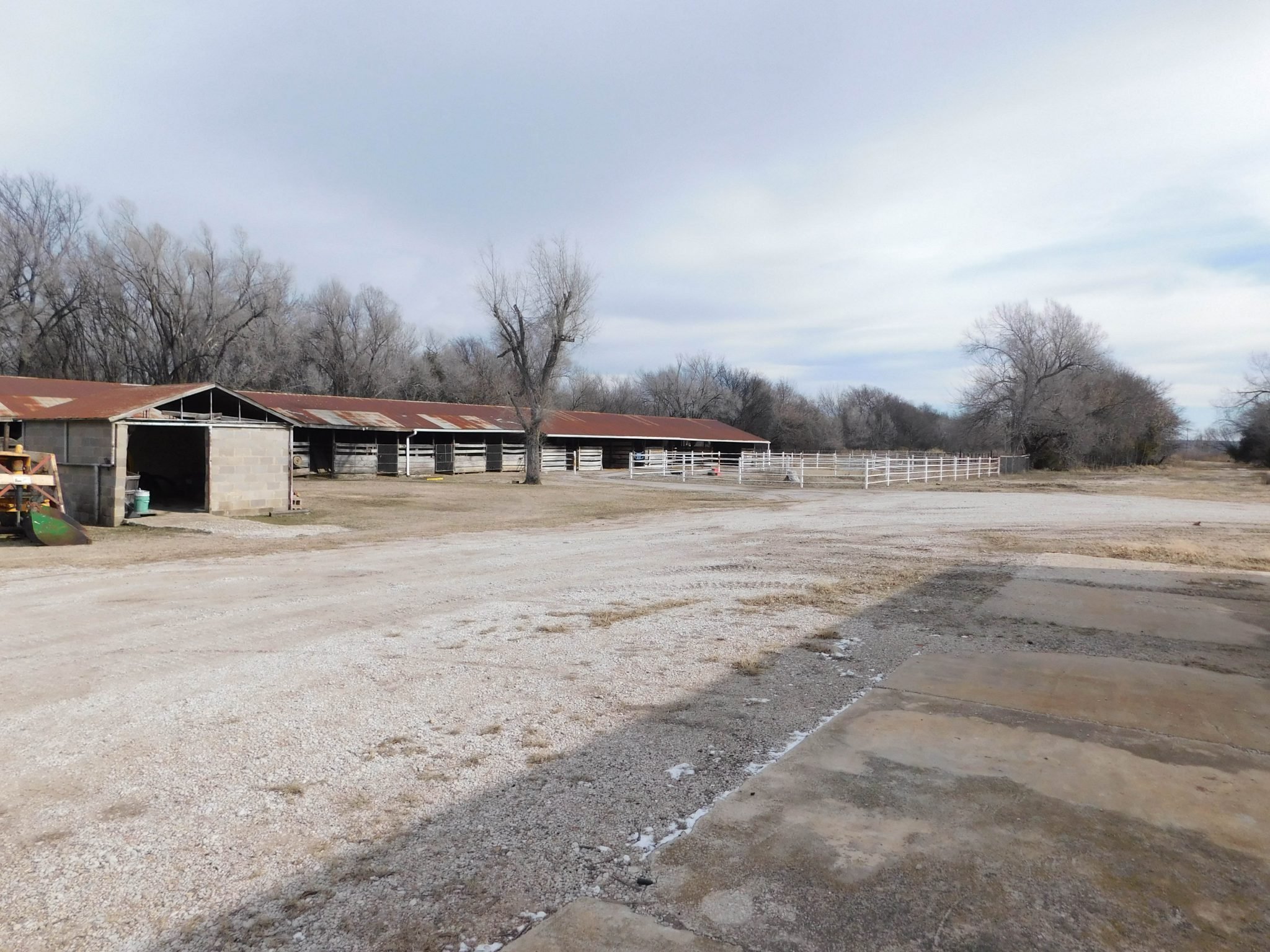 3/6 COMMERCIAL YARD * 9.9± ACRES * OFFICE * SHOP BUILDINGS * HORSE BARN W/STALLS PONCA CITY OK