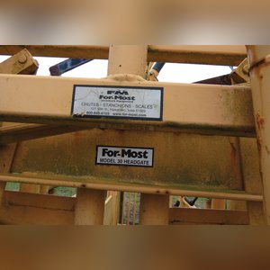 FOR-MOST Model 30 Squeeze Chute with palpation cage on skid
