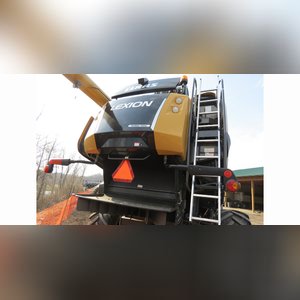 2014 Claas Lexion 740TT Combine, 4WD, CAT C-13 engine, Terra Trac system, 750/65R26 Michelin rears, camera system, AG Leader ready w/ AG Leader screen, corn & soybean threshing system, straw chopper, auto contour, variable-speed feeder house drive, variable-speed rotor drive, HD 330 BU grain tank, HD 28.2â?? unloader auger, 304 gal. fuel tank, high-end light pkg., deluxe cab w/ instructor seat, 460 sep. hrs., 980 engine hrs., SN C6800185 (powertrain warranty expires 7/12/16)