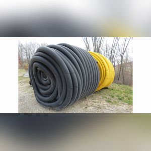 Roll of 4â? & 6â? perforated tile & misc. sticks of tile