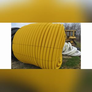 Roll of 4â? & 6â? perforated tile & misc. sticks of tile