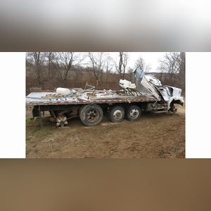 Volvo GM HD truck, tandem-axle w/ 2 cheaters, 24â?? Eby alum. flatbed & side racks, (Wrecked, for parts)