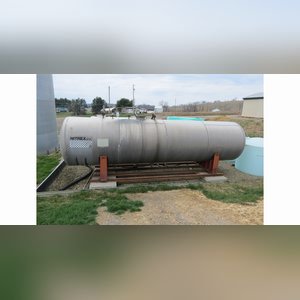 12,000 gal. aluminum tank on steel cradle