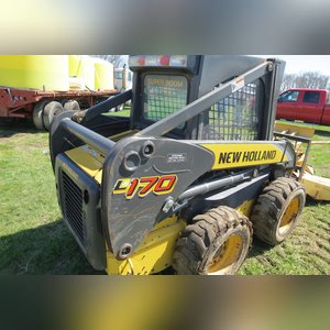 NH Skid Loader 170 with attachments, 1,941 hours, 1 owner, 3rd remote & elec. connect