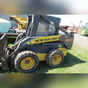 NH Skid Loader 170 with attachments, 1,941 hours, 1 owner, 3rd remote & elec. connect