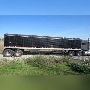 2014 Super Hopper Timpte Grain trailer: 40â?? with black side finish polish alum rims, with roll top air ride, SS front and back, 2 row lights, low miles, 1 owner, VIN# 1TDH40024EB144509