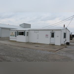 This office building with nearly 1,100 sq. ft. and a full, poured-wall basement, has a natural gas air-forced furnace and central air. This building offers a very nice floor plan which includes 10â??x10â??, 15â??x8â??, and 12â??x7â?? offices, a 12â??x6â?? file room, a large lobby area, and a restroom. In addition, the 9.5â??x60â?? in-ground truck scale with a 120,000 lb. capacity is located immediately in front of this building complete with a UMC 465 digital scale display.