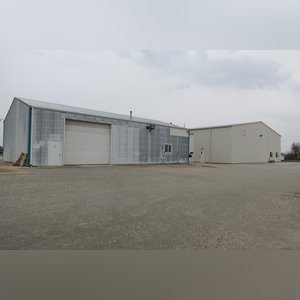 This 45â??x60â?? garage/shop has a concrete floor and approaches, (2) overhead doors with openers (14.5â??x13â?? and 15â??x13â??), (2) walk-in doors, and restroom. The building also includes (2) Vantage LP overhead radiant heaters, (2) Modine high-efficiency LP heaters, an exceptional ventilation system, and 220 amp service.