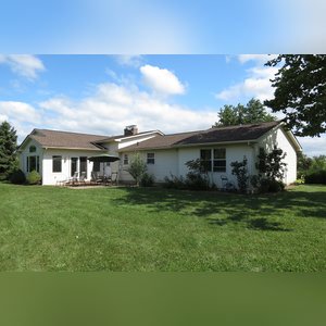 10± acres, home, pole barn, shop building, fenced pastures, and pond. The impressive interior of the home boasts 4 bedrooms and 3 full baths. The master suite is 16â??x16â?? with a large walk-in closet. The master bath has a double sink and a large custom shower. The 22â??x14â?? eat-in kitchen has custom cabinets, granite counter tops, and a brick-front raised fireplace. The large main level also includes the 20â??x14â?? living room with fireplace, 18â??x16â?? family room, 14â??x12â?? office area, mud room, and laundry room. This spacious main level floor plan is ideal for the family as well as entertaining. The full basement is partially finished, and the 2-car attached garage includes a large storage area. Other amenities within the home include a Lennox LP gas forced-air furnace, central air, Pella windows, a newer roof, cathedral ceilings, ceramic tile and wood flooring, ceiling fans, and a Radionon system. The exterior is beautifully landscaped with mature trees, colorful perennials, a small orchard and grape vineyard, a large play area, and a ½ acre stocked pond. The 60â??x50â?? pole barn with walk-in door and 14â??-high end slider includes grooved concrete, maternity pens, custom Gingway gates, a working chute, and 4 individual turn-out pens. There are 6 fenced and cross-fenced pasture areas, each with its own Ritchie waterer. The 34â??x32â?? shop building has a concrete floor, porch, and walk-in and overhead doors.