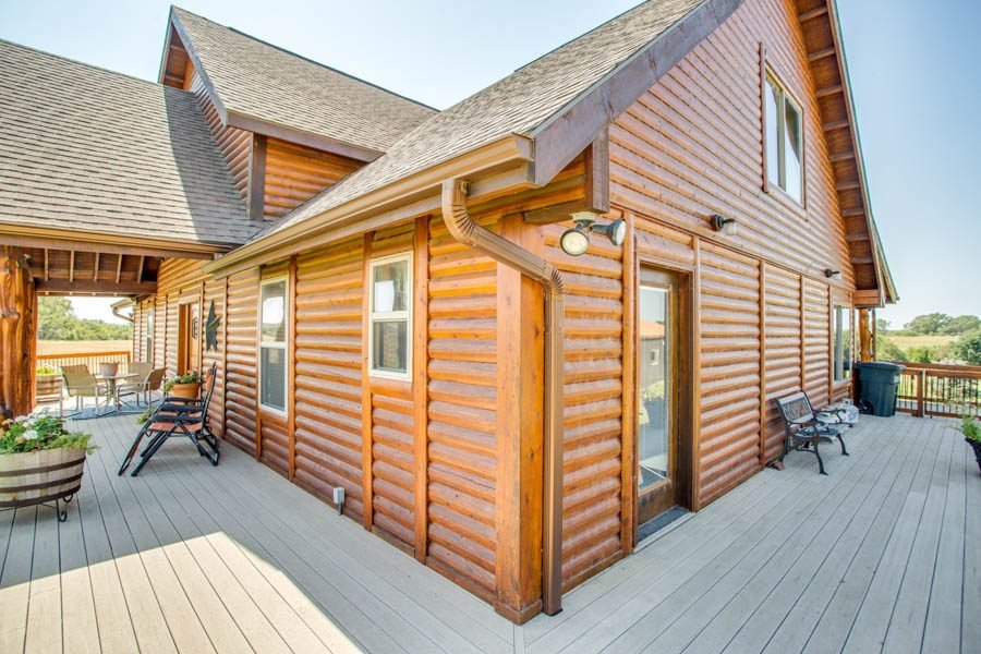 4,600± SqFt Log Home • Shop • Acreage • Pond * Live Creek